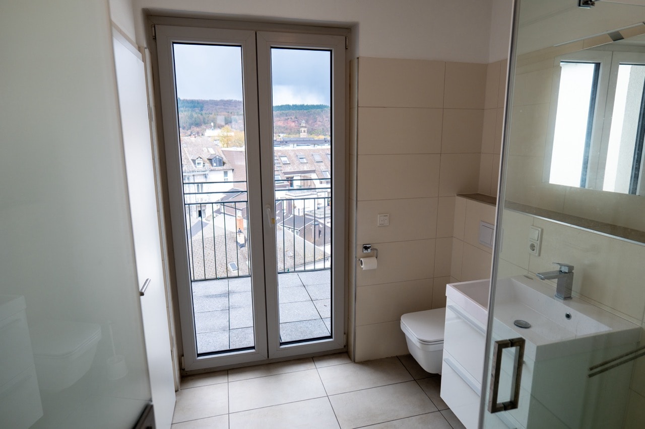 Studio bathroom with rooftop views